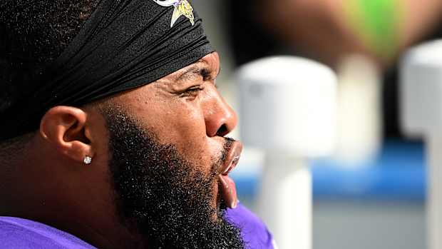 Oct 1, 2023; Charlotte, North Carolina, USA; Minnesota Vikings defensive end Jonathan Bullard (90) on the sidelines in the third quarter at Bank of America Stadium.
